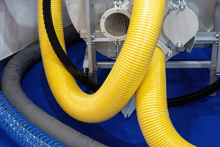 blog photo of a bright yellow ribbed hose among other colored hoses
