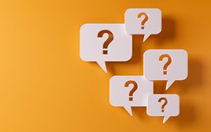 graphic of speech bubbles with question marks inside